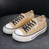 2026 Nueva Versión Coreana Color Sólido Casual Color Caramelo Zapatos de Lona de Caña Baja para Mujer Zapatillas Planas Ligeras Zapatillas de Running de Moda
