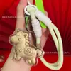 Nuevo Llavero de Caballo Pequeño Princesa de Oro Puro Colgante Creativo de Dibujos Animados Popular al por Mayor Encanto para Teléfono