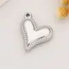 Accesorios de Acero Inoxidable Colgante de Corazón con Pluma de Venta Caliente Estilo Moda Acero de Titanio Colgante DIY Cruz Artículo de Venta Caliente Transfronterizo