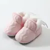 Nuevo modelo venta directa de fábrica zapatos para bebé 0-12 meses transfronterizos zapatos de algodón para bebé invierno zapatos de gamuza de suela blanda para niños y niñas
