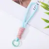 Colgante para teléfono con cordón de dopamina, llavero anudado anti-pérdida, juguete de peluche, cuerda corta de poliéster colorida y creativa al por mayor