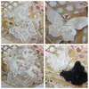 Comercio exterior al por mayor flor organza bordado mariposa cuentas para uñas solubles en agua taladro encaje pegatinas para cara decorativas accesorios de joyería para bodas