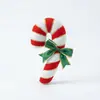 Almohadas de peluche navideñas novedosas transfronterizas: hombre de jengibre, bastón de caramelo, caramelo de menta, árbol de Navidad, muñeco de nieve, cojines de sofá de Papá Noel