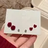 Pendientes de Copo de Nieve de Terciopelo para Mujer Nicho de Gama Alta Pendientes Rojos de Año Nuevo Otoño e Invierno 2025 Nuevo Estilo Caliente Pendientes de Año Nuevo