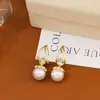 Brincos de pérola com incrustação de diamantes de luxo leve estilo francês, brincos versáteis de moda feminina elegantes e requintados, atacado transfronteiriço