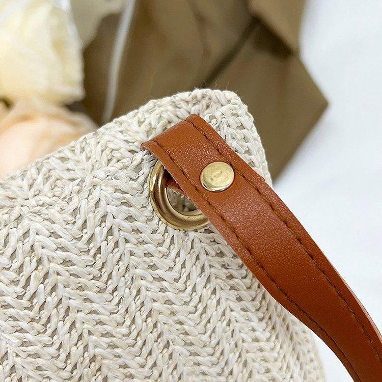 编织包女包新款潮2024夏草编简约百搭小清新水桶包个性单肩斜