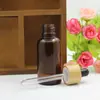 Frasco de vidro marrom para óleo essencial 5-100ml frasco para misturar essência de cuidados com a pele anel de bambu conta-gotas com cabeça de borracha frasco vazio para subembalagem