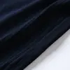 Suéter Tejido de Manga Larga con Cuello Azul Marino, Nuevo Estilo Otoño 2026 para Mujer, Estilo Francés Elegante, Corte Holgado, Top de Moda Adelgazante