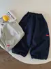 Pantalones Largos para Niños 2026 Otoño Nueva Llegada Niños y Niñas Color Sólido Múltiples Bolsillos Cargo Algodón Casuales Pantalones Jogger para Bebé