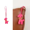 Bolsa de jirafa de moda de alta gama, estilo nuevo, versátil, linda, colgante, borla de bufanda de seda, accesorio de regalo pequeño, transfronterizo