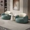 Mesa y sillas de negociación modernas de lujo ligero para sala de estar, balcón, dormitorio, salón de belleza, tienda de ropa, silla individual de cuero con diseño de garra de gato