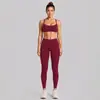 Conjunto de roupa fitness transfronteiriço, com um design traseiro estiloso, um top esportivo de gola halter e calças de yoga de secagem rápida, adequado para corrida ao ar livre, ciclismo e Pilates.