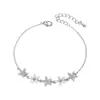 Estilo Nuevo Primavera y Verano Zirconia Micro-pavimentada Temperamento Joyería de Mano Diseño de Nicho para Mujer Pulsera de Ojo de Gato Pétalo Pulsera Versátil
