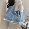 Bolsa jeans feminina 2026 nova tendência moda bolsa de ombro única bolsa tote de grande capacidade para escola e trabalho