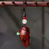Llavero Colgante de Pinza de Cangrejo Tallada en Sándalo Verde y Palo de Rosa con Cangrejo de Pinza de Cangrejo con Dinero en la Mano Pieza de Mango de Madera