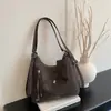 Bolsa de mano transfronteriza, gran capacidad, elegante modelo nuevo 2026, moderna y simple, bolsa casual japonesa y coreana, bolsa para mujer, bolso de hombro, mochila