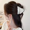 Herramienta mágica para coleta alta, pinza de triángulo de lunares para mujer, nuevo modelo de alta gama 2026, pinza de tiburón pequeña para accesorio de cabello de peinado semi-recogido