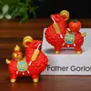 Artículo líder de tendencia nacional: Bolsa de la suerte giratoria con forma de lingote, un lindo adorno de escritorio, una figura de oveja del zodiaco de dibujos animados, perfecta como regalo para el Año de la Oveja