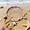 Pingente Popular Europeu e Americano Transfronteiriço de Turquesa Concha Estrela do Mar Pérola Contas de Arroz Feito à Mão Pulseira Comemorativa de Viagem Atração
