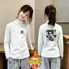 Top de niña con adorno de oreja de madera 2026 Nuevo estilo Niña Polar Casual Ropa interior Otoño Invierno Capa base Infantil Cepillado Manga larga