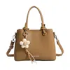 Bolso de Mano con Textura de Lichi Diseño Yue Zi para Mujer 2026 Nuevo Simple Versátil Bolso de Hombro Cruzado Bolso Cubo Texturizado