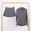 Traje de Chaqueta Lulu con Cuello Alto y Falda de Tres Pliegues Traje Deportivo de Fitness Falso de Dos Piezas Falda de Tenis Elástica Anti-Exposición Todas las Estaciones