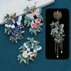 Cheongsam antiguo tapeta de presión temperamento colgante broche electroforesis alto color gota de aceite poroso mariposa baile borla accesorios DIY