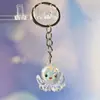 Nuevo Colgante Creativo de Bolsa con Cara Sonriente de Pulpo Brillante Dibujo Animado Pequeño Regalo Llavero de Moda Anillo de Llave