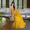 Vestido amarillo de tirantes con cuello en V para mujer, estilo transfronterizo nuevo, fruncido en la cintura, espalda descubierta, largo, para vacaciones en Tailandia