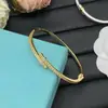 Camiseta de Nuevo Modelo Transfronteriza t Marca Full Diamante Versión de Alta Gama con Logo t Pulsera, Diseño Lujoso y Sencillo, Venta al por Mayor