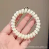 Goma para el pelo de alambre de teléfono con estampado de leopardo retro, alta elasticidad, banda de goma sin marcas para adultos, adecuada para coletas, simple y elegante, no daña el cabello