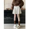 Falda corta de punto color avena, absolutamente impresionante, súper bonita, falda plisada de línea A de cintura alta versátil estilo coreano para mujer primavera y otoño