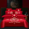 Juego de ropa de cama de lujo estilo chino, hecho de algodón 100% de fibra larga, un juego de cuatro piezas que incluye una sábana y una funda de edredón de algodón puro rojo, perfecto para la alcoba de una recién casada.