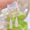 R513 Estética Elegante Francesa Phalaenopsis Largos Elegantes Gota de Agua Perla Pendientes de Lujo Ligero Diseño de Bobina de Mosquito Sin Perforar