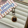 Lindo Llavero de Monstruo de Ojos Grandes y Aterradores Colgante Decorativo Año del Caballo Encanto para Mochila Accesorio Creativo de Halloween para Niñas