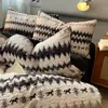 Conjunto de cama de quatro peças em gaze de camada dupla estilo nórdico, adequado para dormitórios estudantis, camas de solteiro ou casal, incluindo uma capa de edredom e um lençol de cama, e pode ser usado em todas as quatro estações
