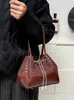 Bolsa Saco 2026 Novo Modelo Bolsa Feminina Primavera Ombro Bolsa de Mão Estilosa Versátil para o Dia a Dia Bolsa Transversal