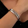Pulsera abierta de metal con textura brillante transfronteriza europea y americana, estilo coreano ins de lujo ligero de alta gama, joyería versátil al por mayor