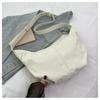 Tela de nailon Moda Estilo coreano Color puro Casual Bolso dumpling 2025 Nuevo Ins Bolso de hombro bandolera Bolso sencillo para mujer