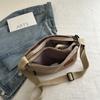 Bolsa Transversal Casual de Comércio Exterior para Homens 2026 Novo Modelo Simples para o Dia a Dia Bolsa de Lona Moda Simples de Viagem Cor Sólida Bolsa de Ombro