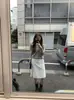 Venta de Liquidación Sin Devoluciones H 2026 Primavera Nuevo Coreano Dongdaemun Ou*Ce Color Sólido Adelgazante Corbata Irregular Falda de Línea A