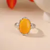 Yuebao Jewelry Ámbar Plata de Ley S925 Flor de Loto Forma de Huevo Nuevo Estilo Chino Tendencia Nacional Étnico Retro Anillo de Plata Fábrica Personalización