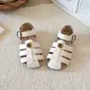 Sandálias Romanas Fechadas com Solado Macio de Camélia para Meninas 2026 Sandálias Versáteis de Princesa para Crianças Sapatos de Praia para Meninas