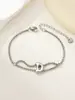 Nuevo Anillo de Acero Inoxidable al por Mayor Transfronterizo 26 Letras Inglesas Anillo de Doble Capa Pulsera Chapada en Oro