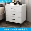 Mesita de noche de madera maciza de lujo ligero pintada en spray tres cajones encimera de roca simple moderna elevada para dormitorio armario de almacenamiento de alta calidad para el hogar