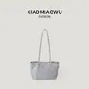 Bolso de hombro ligero de otoño e invierno para estudiantes, un bolso tote de leopardo retro moderno y versátil adecuado para la escuela y el trabajo.