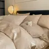 Juego de cuatro piezas de jacquard de algodón de fibra larga de lujo ligero de alta gama, sábana de algodón puro, funda de edredón, sábana bajera, ropa de cama para hotel y casa de huéspedes