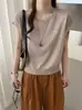 Top de punto de moda de verano 2026 para mujer, corte ajustado, con espalda hueca, diseño de botón de concha y cuello redondo, mangas cortas con volantes