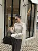 Top de Hombros Descubiertos Estilo Francés Wanwei para Mujer 2026 Otoño Nuevo Una Pieza Transparente Cinta Hombro Asimétrico Camisa Base Y7010