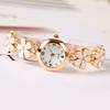 Reloj de Pulsera para Mujer de Corea del Sur Moda Pequeño Fresco Margarita Seis Flores Pequeñas Oro Rosa Pegamento Goteando Reloj de Pulsera